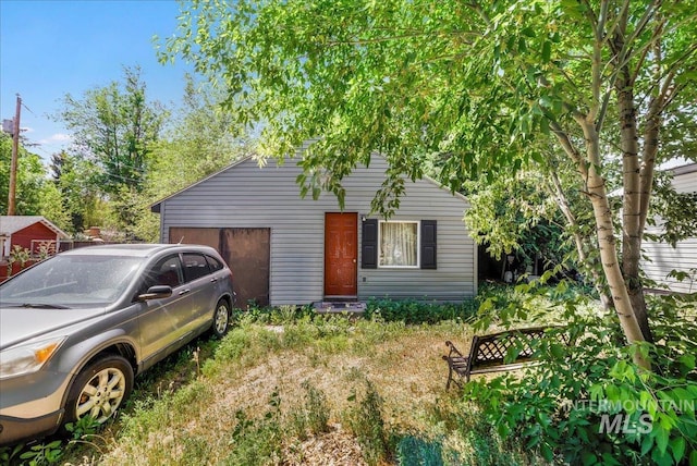 202E 2nd St, Shoshone, ID 83352 - view of front of home with a garage