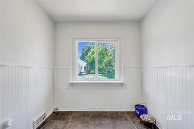 202E 2nd St, Shoshone, ID 83352 - unfurnished room featuring a wainscoted wall