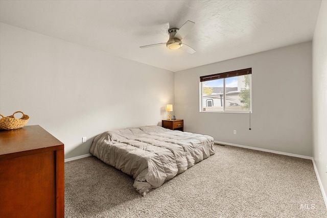 1814 N Rosedust Dr, Kuna, ID 83634 - bedroom with carpet floors, baseboards, and a ceiling fan