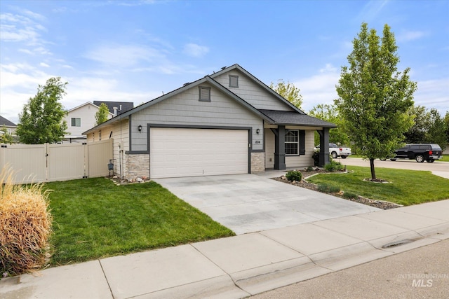 1814 N Rosedust Dr, Kuna, ID 83634 - single story home with a garage, driveway, and a gate