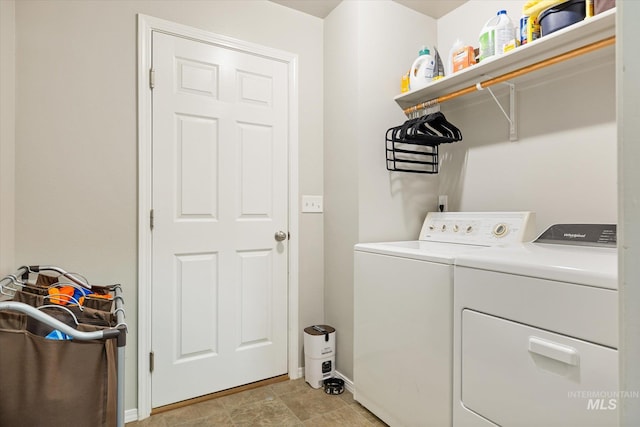1814 N Rosedust Dr, Kuna, ID 83634 - laundry area featuring washer and dryer and baseboards