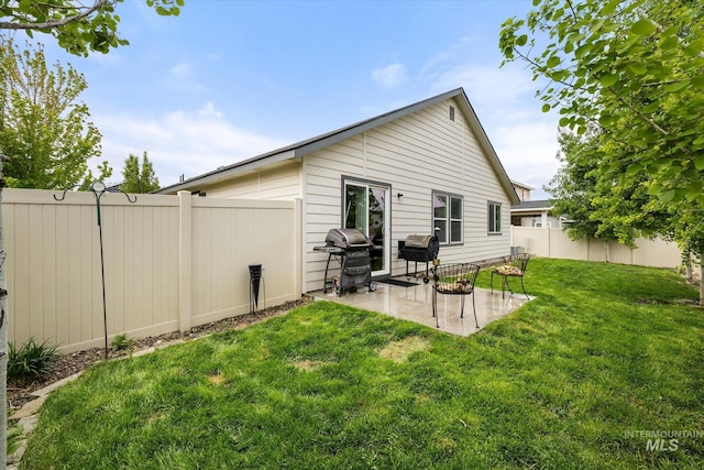 1814 N Rosedust Dr, Kuna, ID 83634 - back of house featuring a patio area