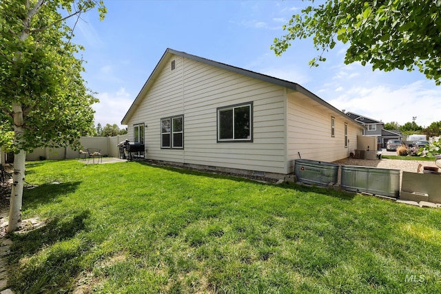 1814 N Rosedust Dr, Kuna, ID 83634 - rear view of house with a patio area