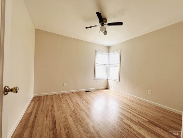 1126 12th St, Clarkston, WA 99403 - empty room with wood finished floors, ceiling fan, and baseboards