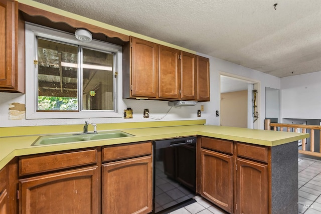 3709 11th St, Lewiston, ID 83501 - kitchen featuring a peninsula, light tile patterned flooring, a textured ceiling, a sink, and dishwasher