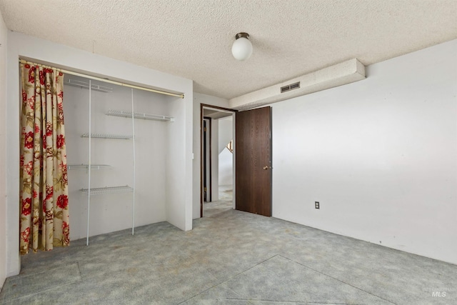 3709 11th St, Lewiston, ID 83501 - unfurnished bedroom featuring carpet floors, a textured ceiling, visible vents, and a closet