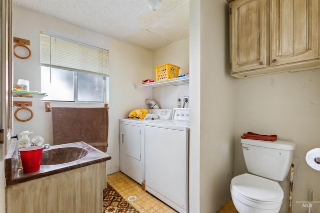 3709 11th St, Lewiston, ID 83501 - half bathroom featuring a sink, independent washer and dryer, tile patterned floors, and toilet