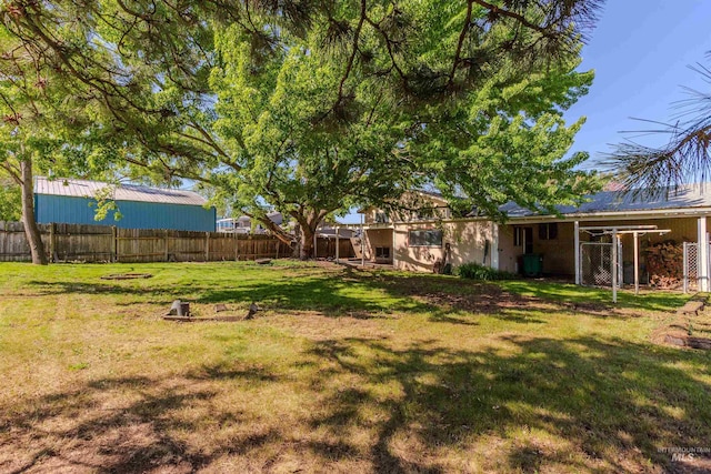 view of yard with fence