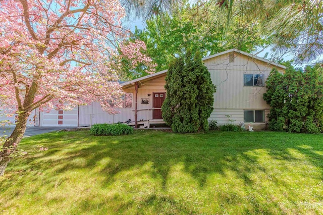 3709 11th St, Lewiston, ID 83501 - view of front of home with an attached garage and a front lawn