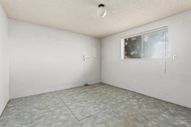 3709 11th St, Lewiston, ID 83501 - carpeted spare room with a textured ceiling
