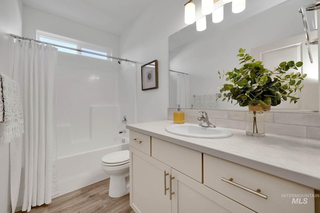 17869 N Onaway Ave, Nampa, ID 83686 - full bath with wood finished floors, vanity, toilet, and shower / tub combo