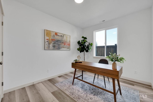 17869 N Onaway Ave, Nampa, ID 83686 - home office with baseboards and light wood-type flooring