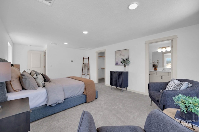 17869 N Onaway Ave, Nampa, ID 83686 - bedroom featuring carpet flooring, a walk in closet, ensuite bathroom, recessed lighting, and baseboards