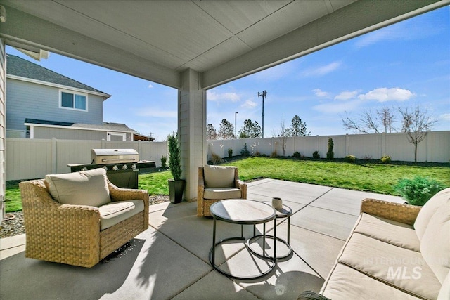 view of patio featuring a fenced backyard