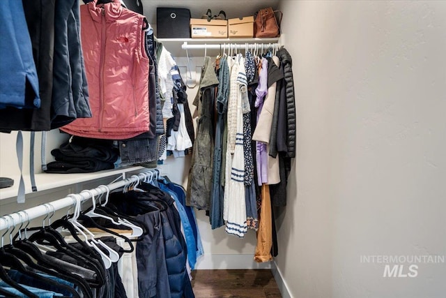 7682 W Itasco Dr, Boise, ID 83709 - walk in closet featuring wood finished floors
