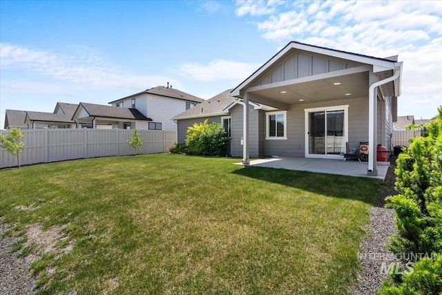 7682 W Itasco Dr, Boise, ID 83709 - back of property featuring board and batten siding and a patio area