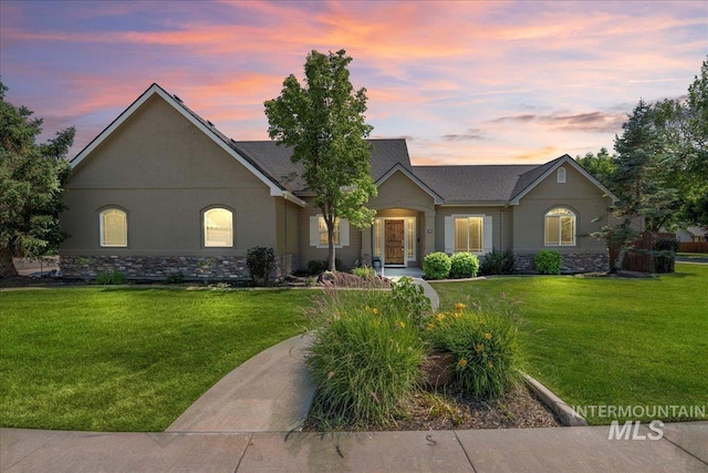 551 N Hannah Pl, Star, ID 83669 - ranch-style house with stone siding, a front yard, and stucco siding