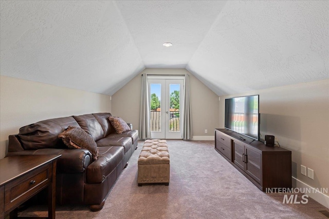 551 N Hannah Pl, Star, ID 83669 - carpeted living area featuring a textured ceiling and lofted ceiling