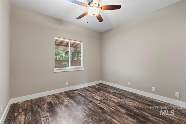 551 N Hannah Pl, Star, ID 83669 - empty room featuring dark wood-style floors and a ceiling fan