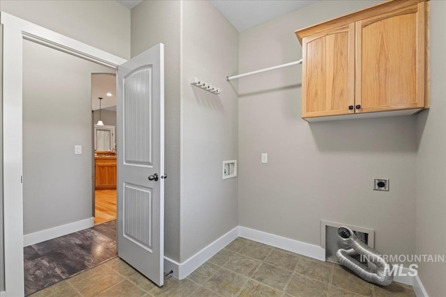 551 N Hannah Pl, Star, ID 83669 - laundry area with electric dryer hookup, cabinet space, and washer hookup