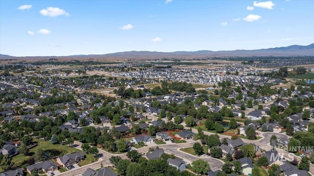 551 N Hannah Pl, Star, ID 83669 - aerial view of property's location featuring mountains and nearby suburban area
