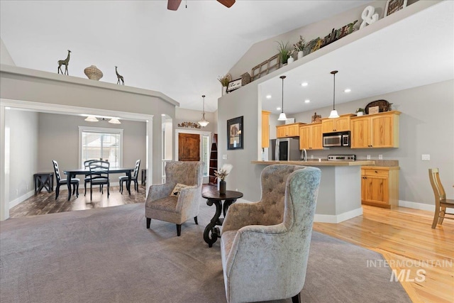 551 N Hannah Pl, Star, ID 83669 - living area with light wood-style flooring, a ceiling fan, high vaulted ceiling, and recessed lighting