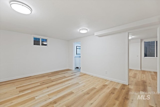 5805 W Robertson Dr, Boise, ID 83709 - finished basement with light wood-style flooring and baseboards