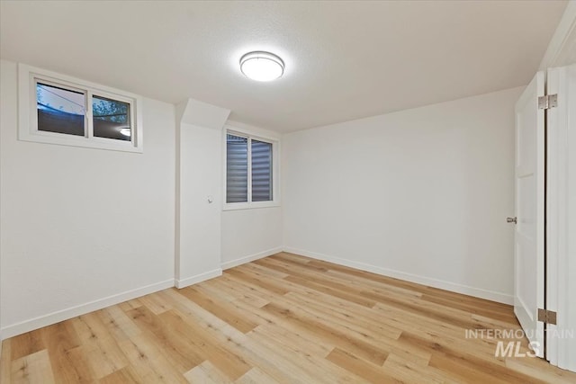 5805 W Robertson Dr, Boise, ID 83709 - interior space featuring light wood-type flooring and baseboards