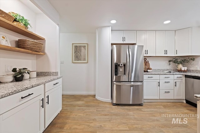 5805 W Robertson Dr, Boise, ID 83709 - kitchen with open shelves, appliances with stainless steel finishes, white cabinetry, and recessed lighting