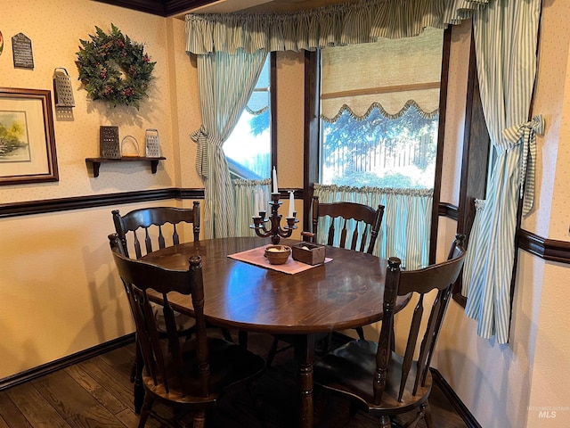 dining space with dark wood-type flooring