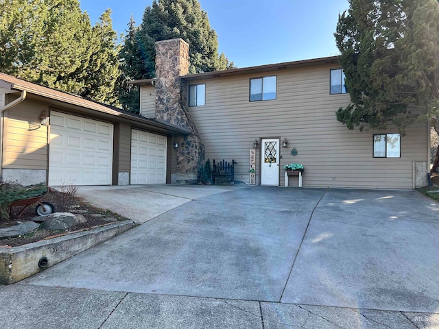 view of front of property with a garage