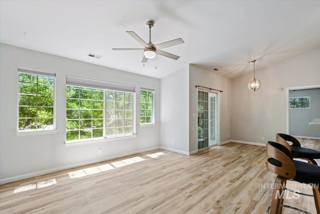 2285 S Challenger Unit 201, Boise, ID 83705 - office space featuring baseboards, wood finished floors, and ceiling fan