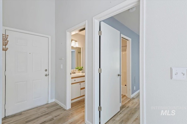 2285 S Challenger Unit 201, Boise, ID 83705 - foyer with light wood finished floors and baseboards