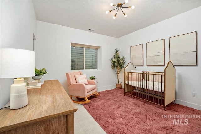 12975 Shasta Daisy Way, Nampa, ID 83686 - bedroom with a chandelier, carpet flooring, baseboards, and a crib