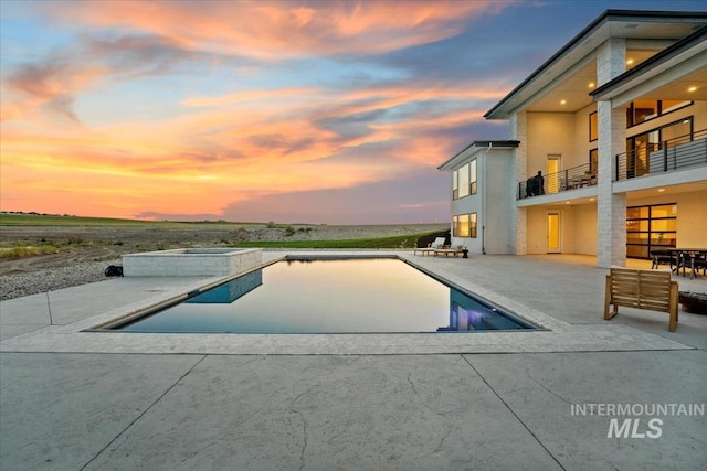 12975 Shasta Daisy Way, Nampa, ID 83686 - view of pool with a patio area and a pool with connected hot tub