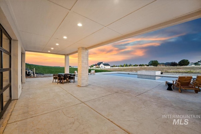 12975 Shasta Daisy Way, Nampa, ID 83686 - view of patio / terrace featuring an outdoor pool and outdoor dining space