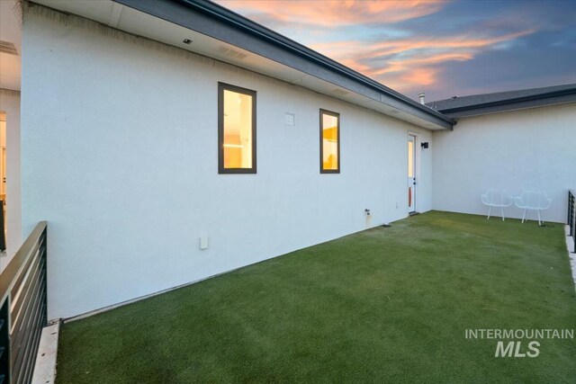 12975 Shasta Daisy Way, Nampa, ID 83686 - back of property featuring stucco siding