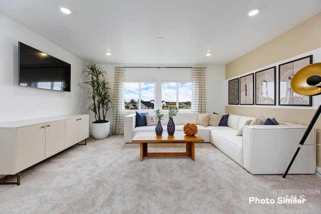 living room with light colored carpet