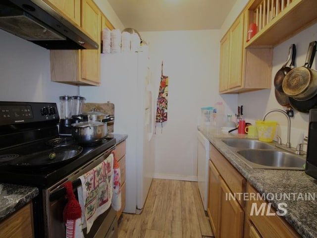 210 W 2nd St, Middleton, ID 83644 - kitchen with black range with electric stovetop, under cabinet range hood, a sink, light wood finished floors, and white dishwasher