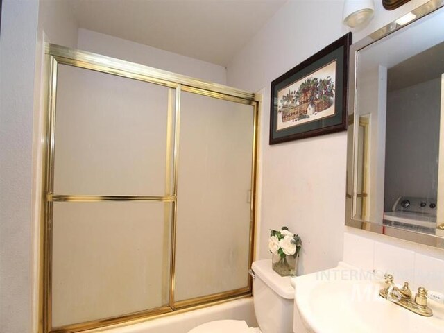 210 W 2nd St, Middleton, ID 83644 - full bathroom featuring toilet, bath / shower combo with glass door, and vanity