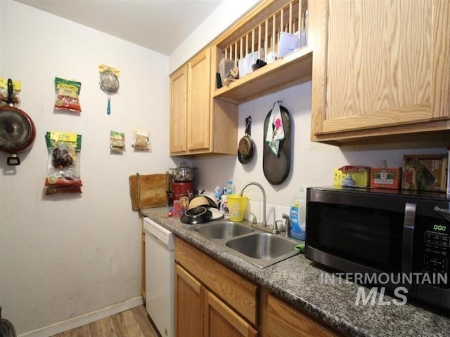 210 W 2nd St, Middleton, ID 83644 - kitchen with a sink, dishwasher, stainless steel microwave, light wood-type flooring, and baseboards