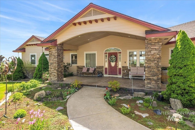 10395 Willis Rd, Middleton, ID 83644 - view of front of home with a porch and stone siding