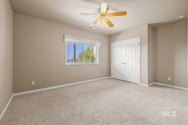 10395 Willis Rd, Middleton, ID 83644 - unfurnished bedroom with light carpet, baseboards, and visible vents
