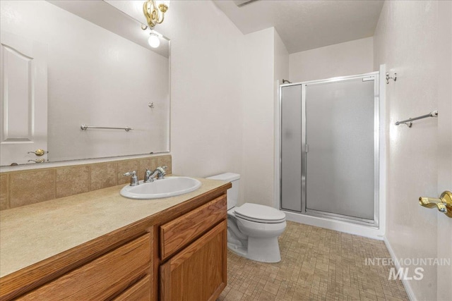 10395 Willis Rd, Middleton, ID 83644 - full bath with a shower stall, vanity, and toilet