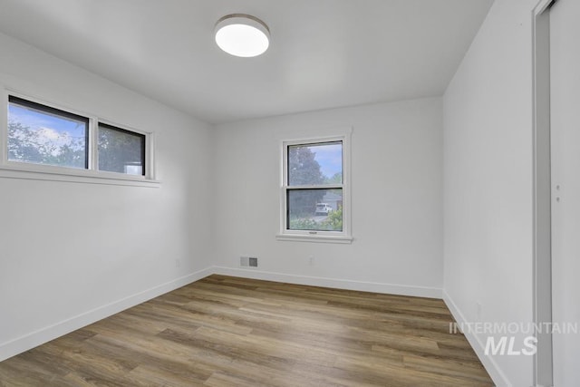 357 Pierce St, Twin Falls, ID 83301 - unfurnished room featuring wood finished floors and baseboards