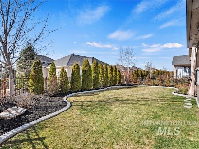 view of yard featuring a fenced backyard