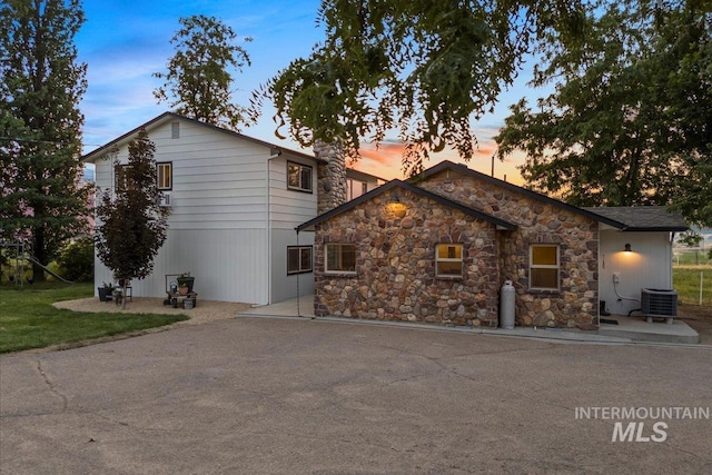 view of front of home featuring central AC unit