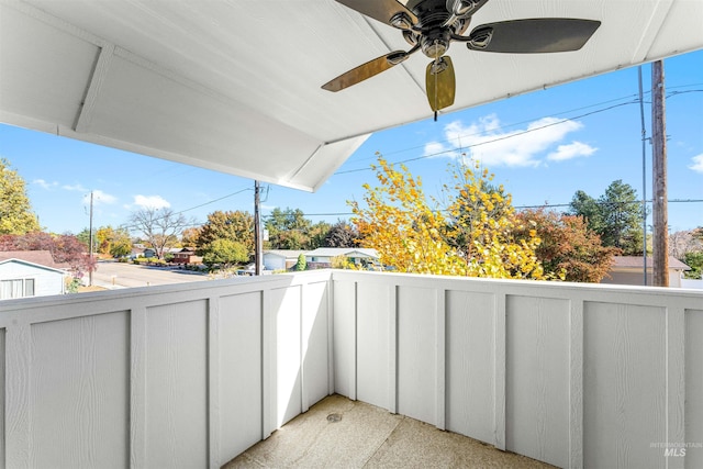 balcony featuring a ceiling fan