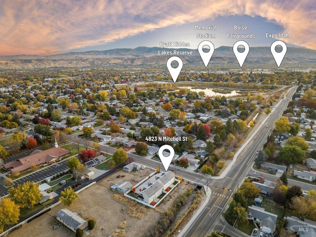 drone / aerial view featuring a mountain view