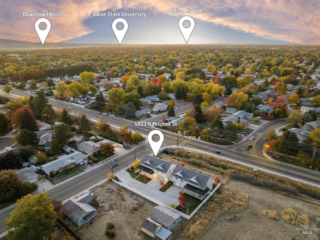 aerial view at dusk with a residential view